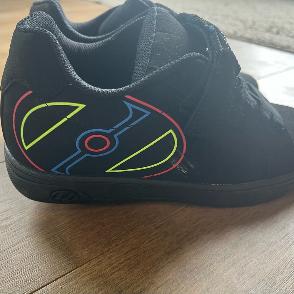 Heelys Black Kids Sneakers with Neon Yellow, Blue & Red Graphic